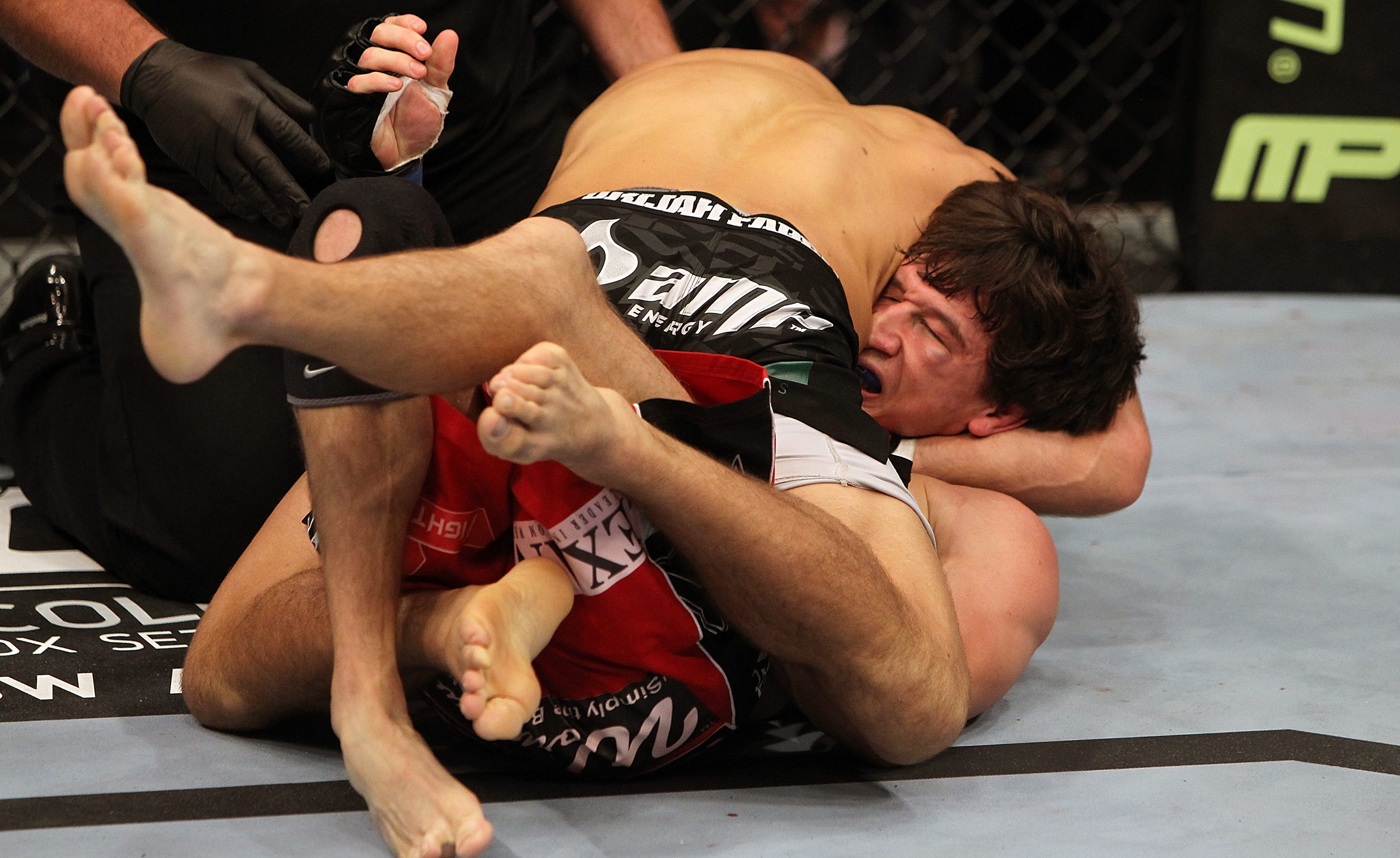 Urijah Faber (top) holds Brian Bowles (bottom)