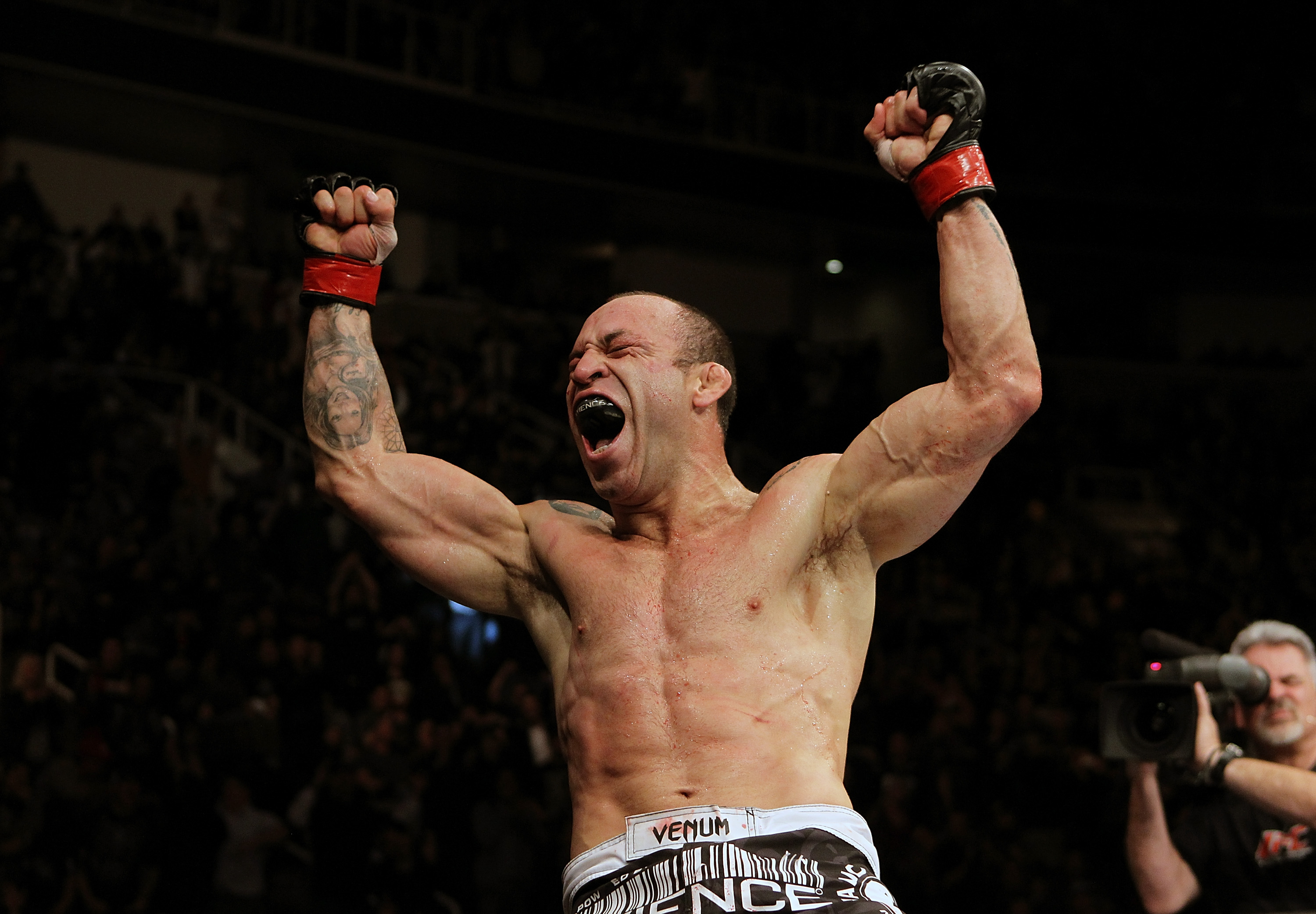 Wanderlei Silva celebrates defeating Cung Le